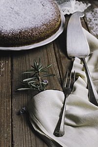 stainless steel fork on gray textile thumbnail