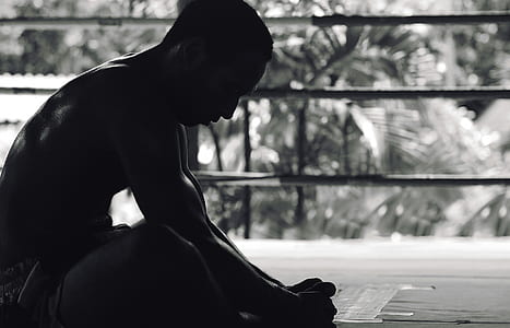 silhouette of sitting man during daytime thumbnail