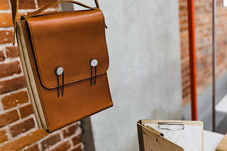 Architecture plans in an elegant leather bag thumbnail