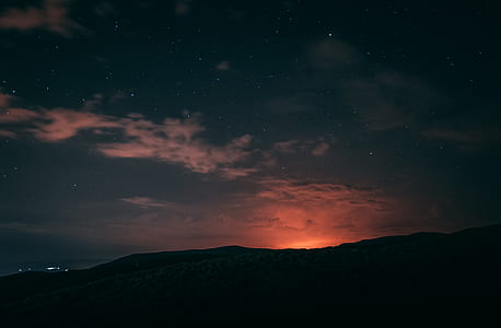 silhouette photography of mountain thumbnail