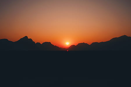 silhouette of mountain during sunset thumbnail