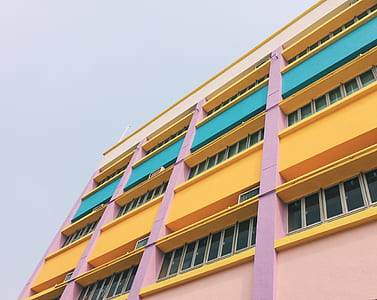 orange high-rise concrete building thumbnail