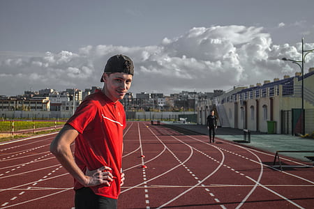 man standing on trackfield thumbnail
