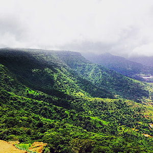 landscape photo of mountain during daytime thumbnail