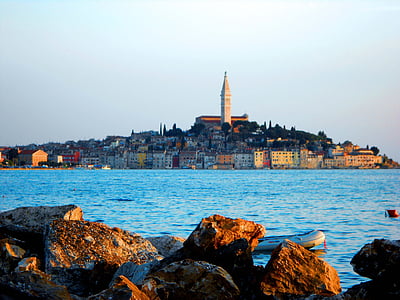 buildings near body of water thumbnail