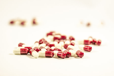 white and red medication pills thumbnail