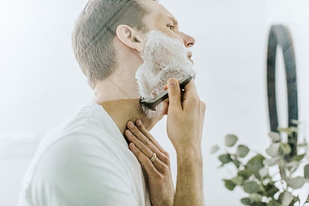 man shaving beard thumbnail