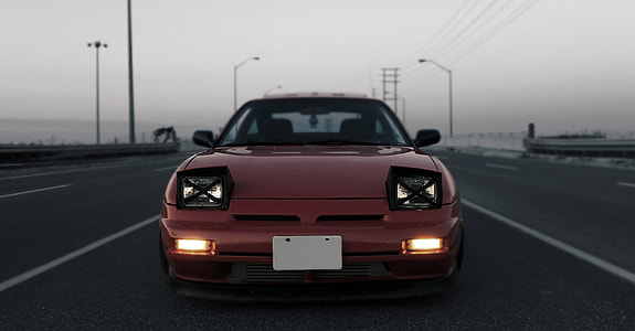 Red Sports Car on the Road thumbnail