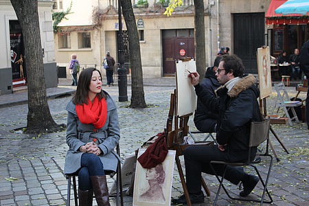 woman sitting in front of painter thumbnail