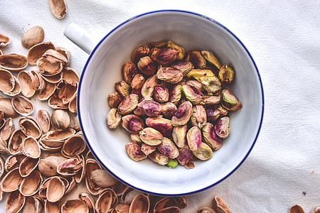 brown seeds in white bowl closeup photography thumbnail