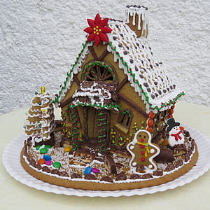 brown and white Christmas house cake thumbnail