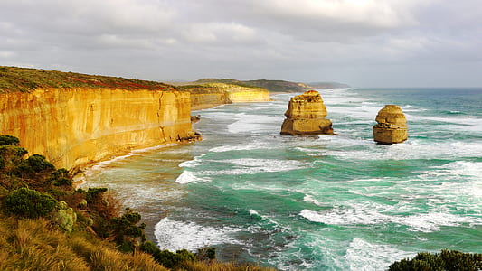 landscape photo of shoreline with cliff thumbnail