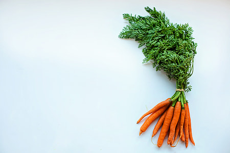 bunch of carrots on white surface thumbnail