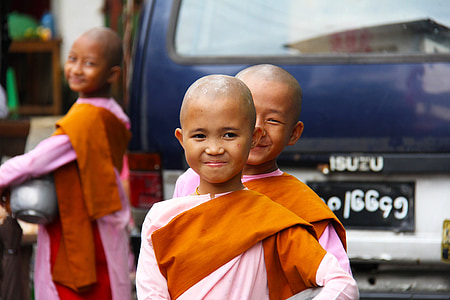 photo of boy wearing pink and brown dress thumbnail