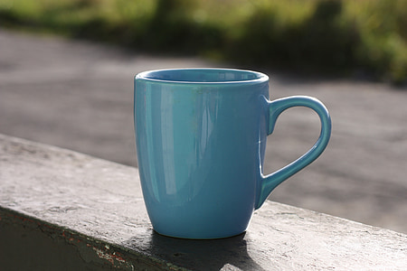close up photography of green ceramic mug during day time thumbnail