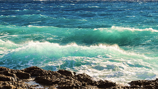 ocean waves at daytime thumbnail