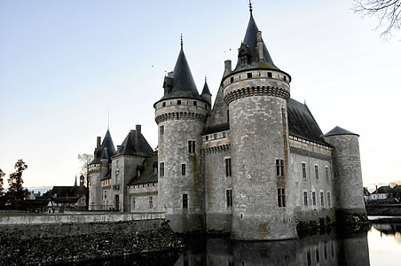 grey concrete castle under white sky thumbnail