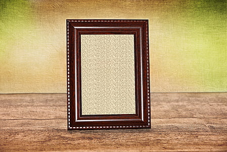 black photo frame on top of brown wood thumbnail