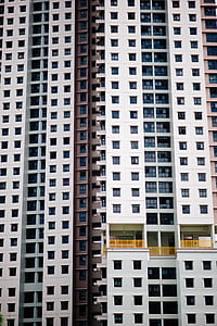 brown and white high rise building thumbnail