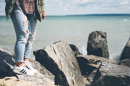 person standing on rock thumbnail