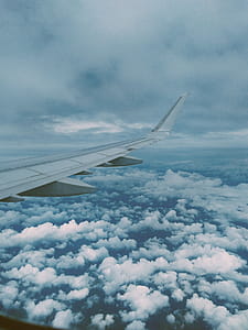 Airplane Wing and Thick Clouds thumbnail