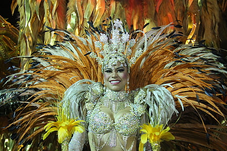 woman in white and orange costume thumbnail