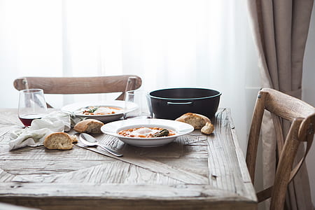 two white plates on table thumbnail