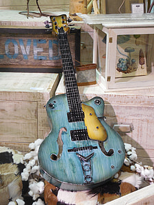blue wooden cut away guitar thumbnail