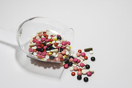 clear footed glass pouring medication tablet and capsule thumbnail