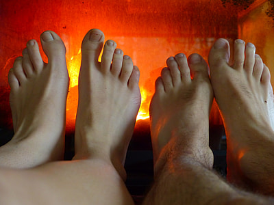 two feet near fireplace thumbnail