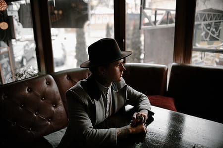 man in gray coat posing for phootshoot thumbnail