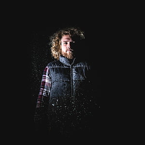 man wearing black leather vest thumbnail