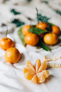 Still life of mandarin oranges with leaves thumbnail