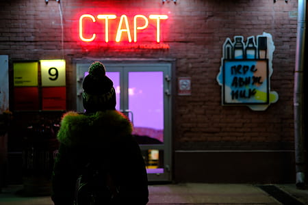 back view photo of person standing near CTAPT storefront thumbnail