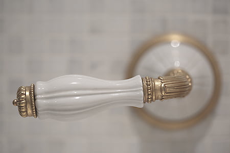 closeup photo of white door lever thumbnail