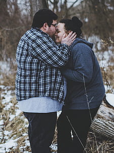 man kissing woman's forehead thumbnail