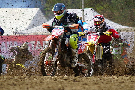 dirt bike race during daytime thumbnail