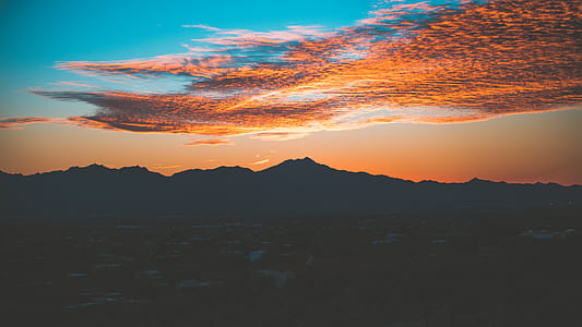 landscape photography of mountain during golden time thumbnail