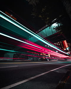 timelapse photography of overpass on road thumbnail