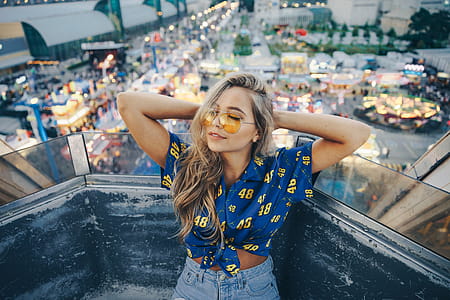 Model Poses Casually On Ride Photo thumbnail