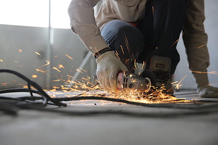 Person Holding Grinder thumbnail