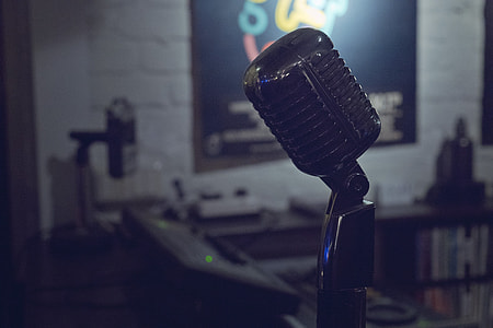 black studio microphone inside studio thumbnail