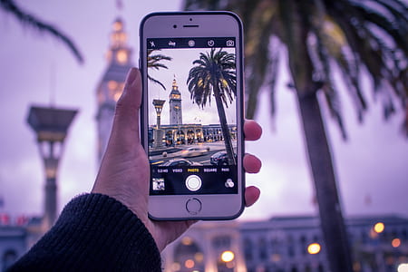 person holding iPhone thumbnail