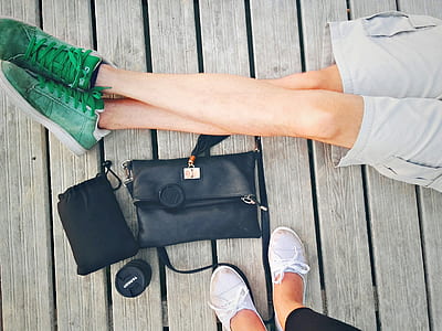 black leather bag beside the camera lens thumbnail