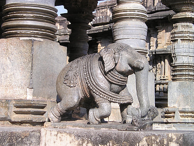 elephant statue beside pillar thumbnail