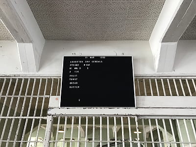 turned on monitor on metal cage door thumbnail