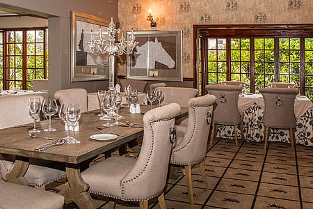 photo of rectangular brown wooden dining table filled with wine glasses thumbnail