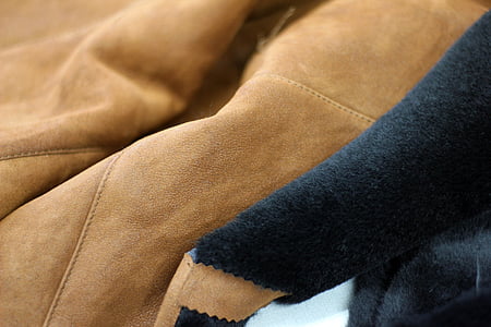 brown and black textile thumbnail