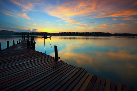 wooden beach dock viewing calm sea thumbnail