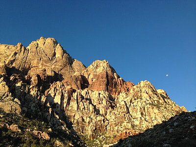 brown mountain under moon during daylight thumbnail